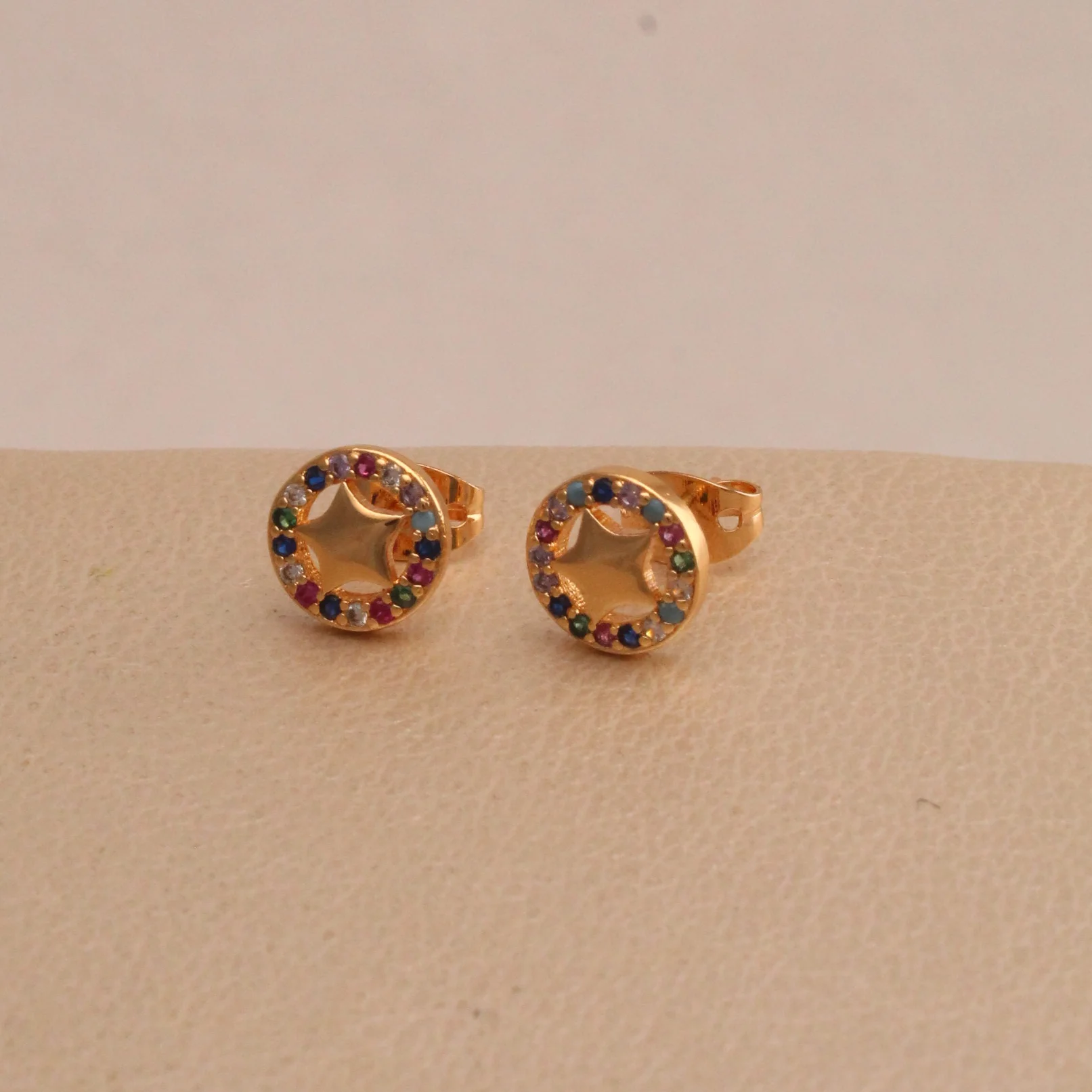 Top. micro-zircon estrella centro c rodio 0,7cm - TRG779